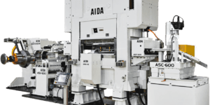 AIDA ENGINEERING Ltd., AIDA-America, EV drive motor core high-speed press, automated production, Nikkan Kogyo Shimbun